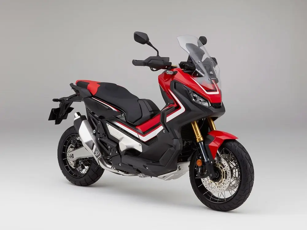 vsvm10 0648 Honda X ADV Victory Red front three quarter studio